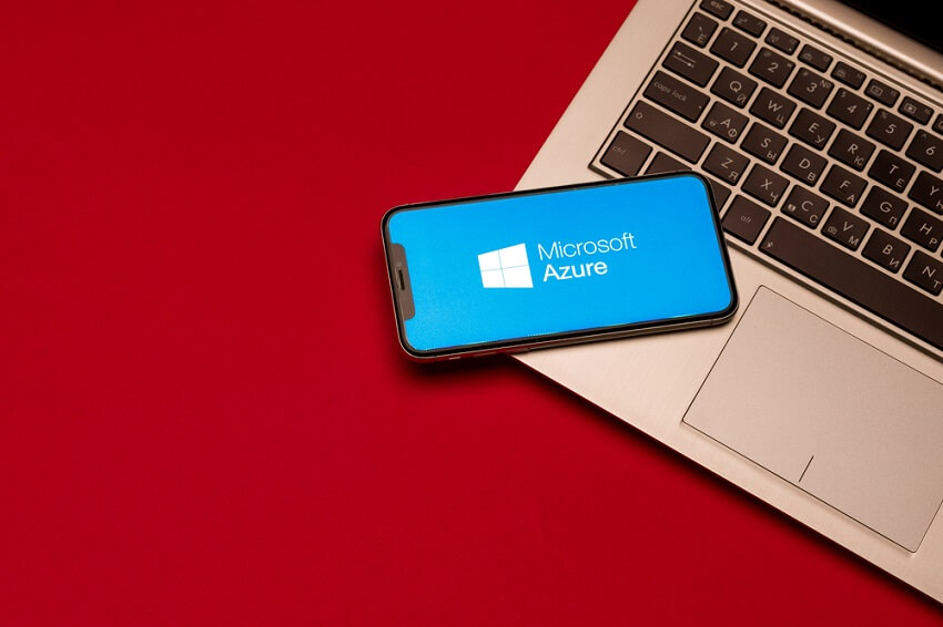 Tula, Russia August 19, 2019: Microsoft Azure Displayed On A Iphone X Near Modern Laptop On Desk